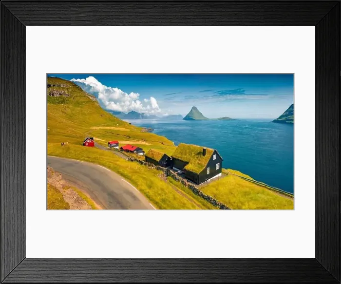 Framed Print : Colorful summer view from flying drone of Velbastadur village with typical turf-top houses Framed Print : Colorful summer view from flying drone of Velbastadur village with typical turf-top houses