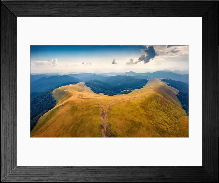 Framed Print : Majestic summer view from flying drone of Menchul mountain range with old country road Framed Print : Majestic summer view from flying drone of Menchul mountain range with old country road