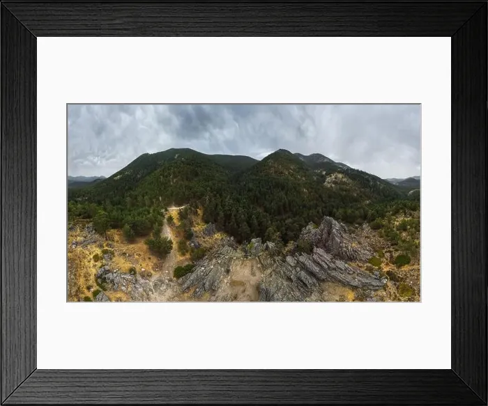 Framed Print : Drone aerial top view of lush green trees growing in woodland against cloudy mountain in countryside Framed Print : Drone aerial top view of lush green trees growing in woodland against cloudy mountain in countryside