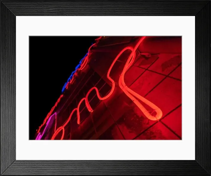 Framed Print : Illuminated letters and words made with neon lights and LEDs of many colors and red and totally black background Framed Print : Illuminated letters and words made with neon lights and LEDs of many colors and red and totally black background