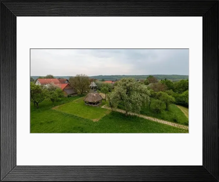 Framed Print : Old wooden bell tower with thatched roof. The region's symbolic landmark. Part of the Orseg national Park in Hungary Framed Print : Old wooden bell tower with thatched roof. The region's symbolic landmark. Part of the Orseg national Park in Hungary