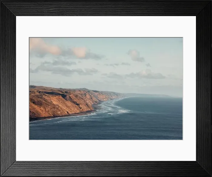 Framed Print : A stunning ocean coastline captured at sunset, revealing infinite horizons