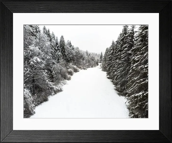 Framed Print : Valley with snow covered trees in winter. Aerial drone view Framed Print : Valley with snow covered trees in winter. Aerial drone view