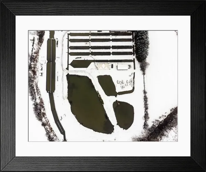 Framed Print : Top down drone view of fish farming ponds at rural area. Winter time. Landscape covered in snow Framed Print : Top down drone view of fish farming ponds at rural area. Winter time. Landscape covered in snow