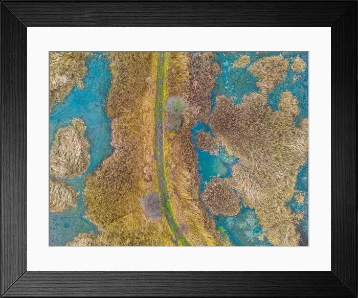 Framed Print : An aerial shot of the landscape with small lake surrounded by trees and field Framed Print : An aerial shot of the landscape with small lake surrounded by trees and field