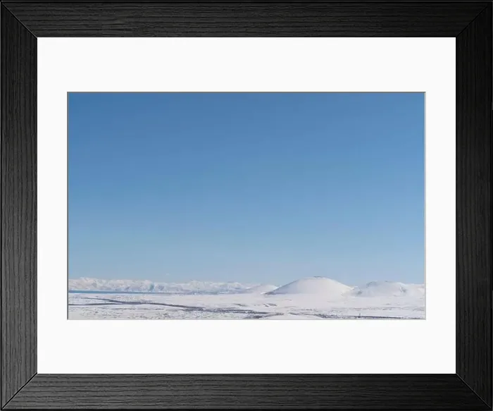 Framed Print : Aerial view snow covered mountains. Snowy mountain ridge on winter sunrise. Stunning mountains range covered with snow Framed Print : Aerial view snow covered mountains. Snowy mountain ridge on winter sunrise. Stunning mountains range covered with snow