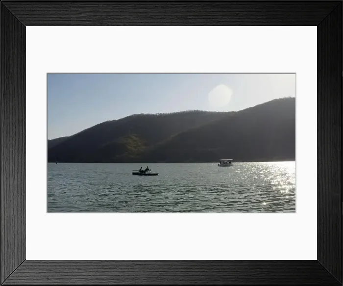 Framed Print : View of floating tourists on the sea Framed Print : View of floating tourists on the sea