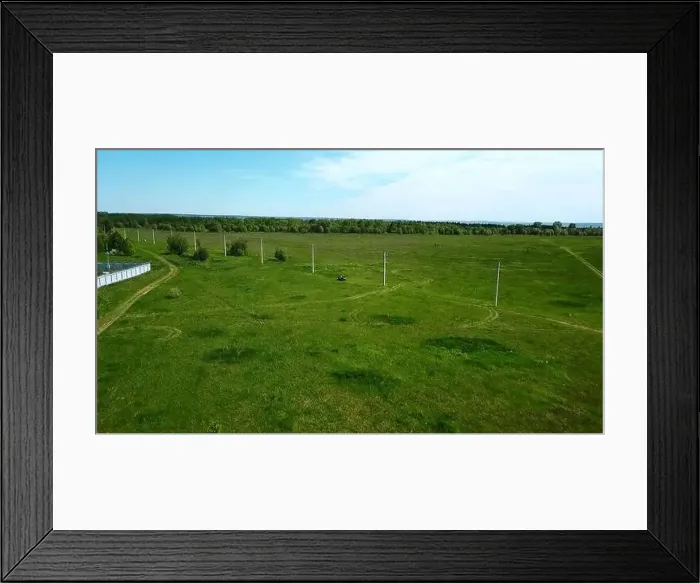 Framed Print : Top view of car in green field in summer Framed Print : Top view of car in green field in summer