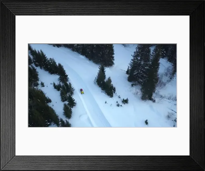 Framed Print : Top view of snowmobile riding in winter forest Framed Print : Top view of snowmobile riding in winter forest