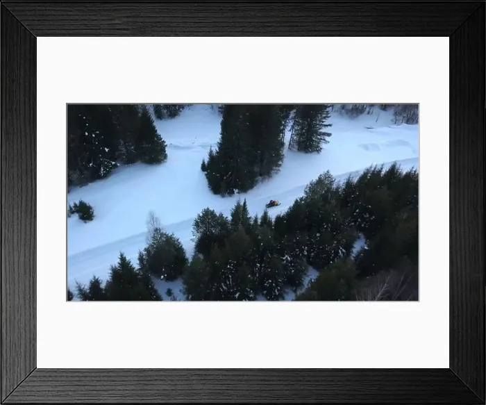 Framed Print : Top view of snowmobile riding in winter forest Framed Print : Top view of snowmobile riding in winter forest