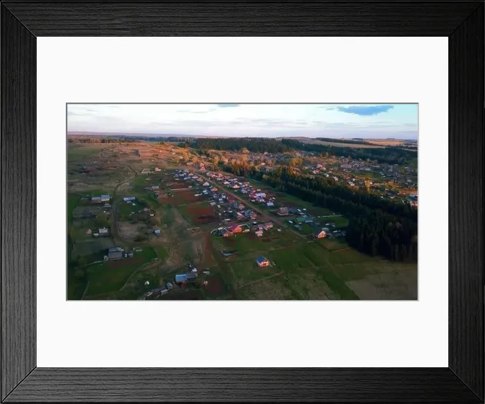 Framed Print : A quiet view of a provincial town next to a forest Framed Print : A quiet view of a provincial town next to a forest