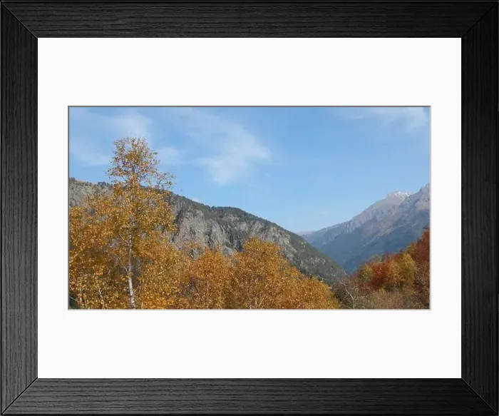 Framed Print : Beautiful view of autumn trees on background of mountains Framed Print : Beautiful view of autumn trees on background of mountains