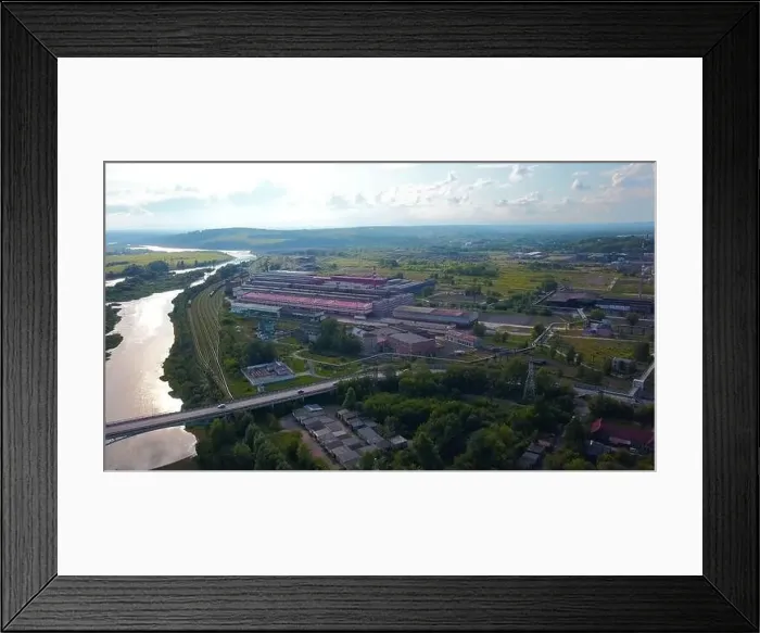 Framed Print : Top view of small factory town by river Framed Print : Top view of small factory town by river