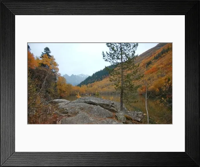 Framed Print : Beautiful landscape with autumn forest in mountain valley and peaks on horizon Framed Print : Beautiful landscape with autumn forest in mountain valley and peaks on horizon