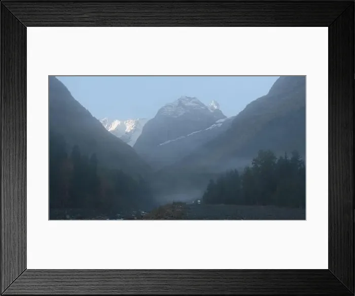 Framed Print : Valley with rocky mountains and moving fog Framed Print : Valley with rocky mountains and moving fog