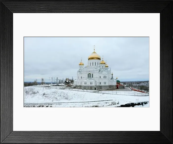 Framed Print : Winter view. Clip. Snow strewn on the road and a large white Orthodox church with golden domes Framed Print : Winter view. Clip. Snow strewn on the road and a large white Orthodox church with golden domes