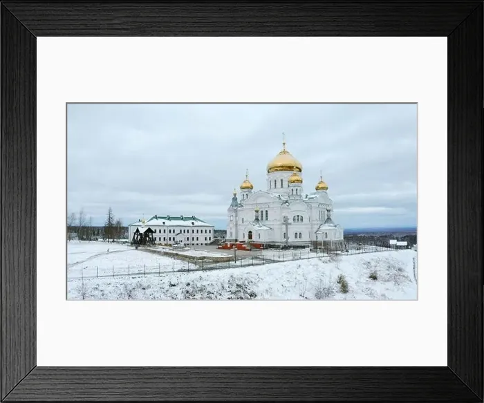 Framed Print : Winter view. Clip. Snow strewn on the road and a large white Orthodox church with golden domes Framed Print : Winter view. Clip. Snow strewn on the road and a large white Orthodox church with golden domes