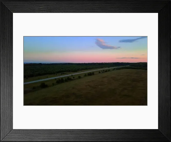 Framed Print : View from high on a colorful picturesque sky with a road Framed Print : View from high on a colorful picturesque sky with a road