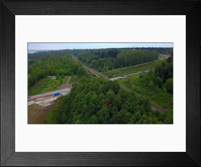 Framed Print : Road next to forest and river. Drone view Framed Print : Road next to forest and river. Drone view