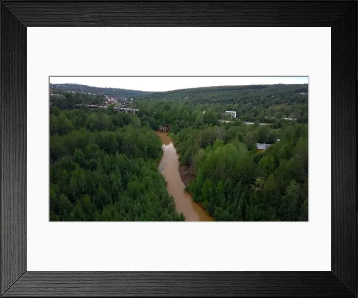 Framed Print : Road next to forest and river. Drone view Framed Print : Road next to forest and river. Drone view