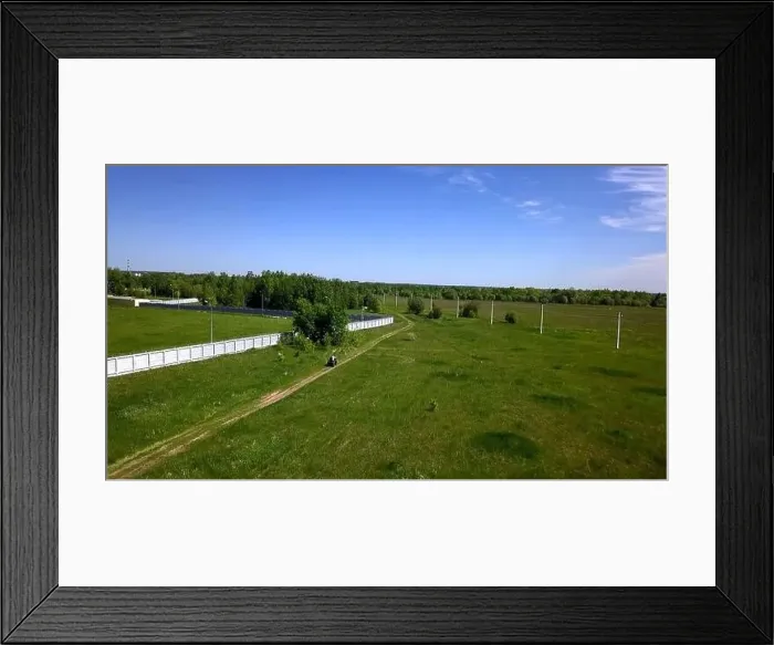 Framed Print : View from high on a colorful picturesque sky with a road Framed Print : View from high on a colorful picturesque sky with a road
