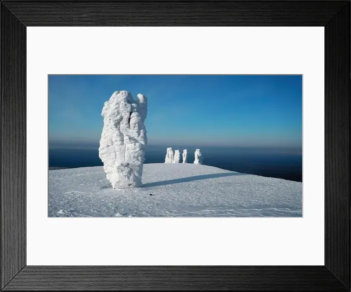 Framed Print : Snowy frozen hills. Clip.Snowy landscape on a hill with frozen ice stones and blue sky overhead Framed Print : Snowy frozen hills. Clip.Snowy landscape on a hill with frozen ice stones and blue sky overhead