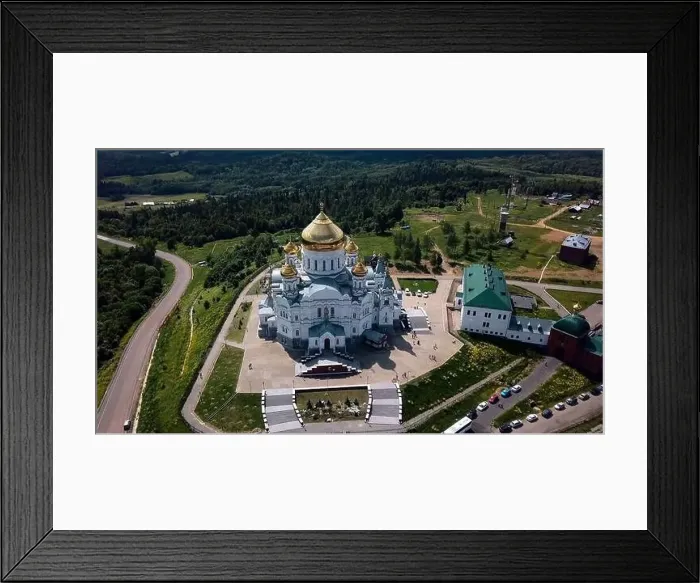 Framed Print : View from a height of a summer landscape with a forest and mountains Framed Print : View from a height of a summer landscape with a forest and mountains