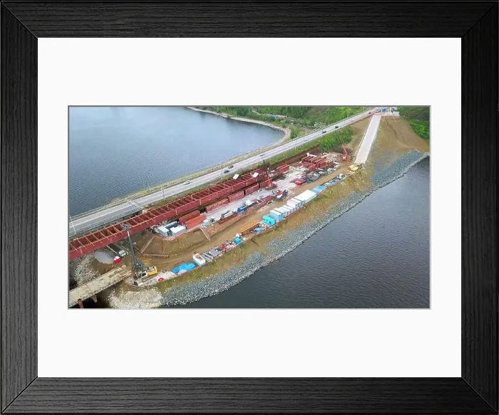 Framed Print : Drone view of the cityscape over the river Framed Print : Drone view of the cityscape over the river