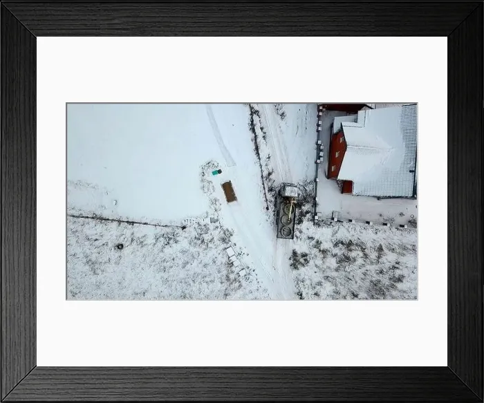 Framed Print : Cargo transportation.Clip. Winter track shot from a height on huge loaded cars next to fences Framed Print : Cargo transportation.Clip. Winter track shot from a height on huge loaded cars next to fences