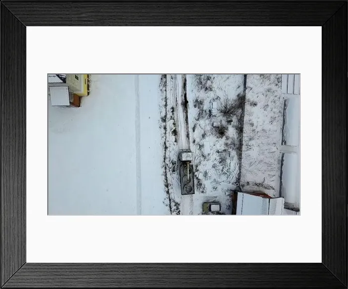 Framed Print : Cargo transportation.Clip. Winter track shot from a height on huge loaded cars next to fences Framed Print : Cargo transportation.Clip. Winter track shot from a height on huge loaded cars next to fences