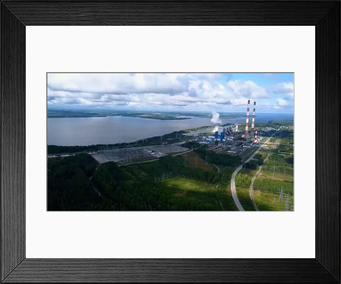Framed Print : Bird's-eye view. Clip.Green forest around the river with plants around and pipes and white clouds around Framed Print : Bird's-eye view. Clip.Green forest around the river with plants around and pipes and white clouds around