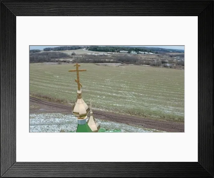 Framed Print : Top view of church cross on background of village fields Framed Print : Top view of church cross on background of village fields