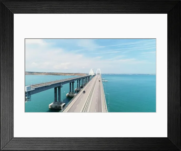 Framed Print : Top view of beautiful bridge over blue sea Framed Print : Top view of beautiful bridge over blue sea