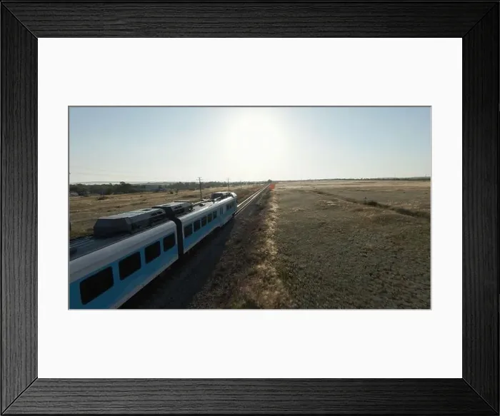 Framed Print : Drone is moving behind train. Shot Framed Print : Drone is moving behind train. Shot