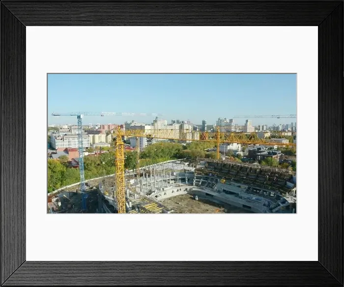 Framed Print : Top view of construction of sports arena with cranes Framed Print : Top view of construction of sports arena with cranes