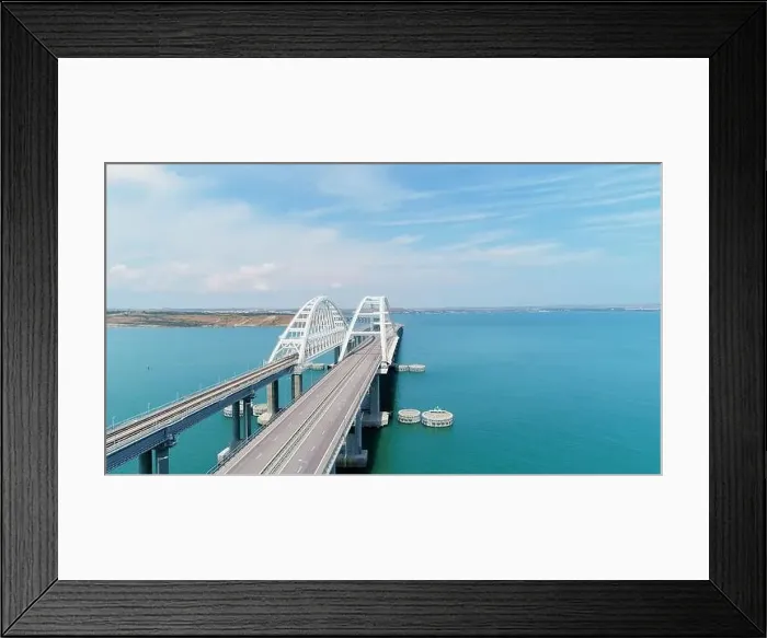 Framed Print : A long bridge for vehicles to cross the ocean Framed Print : A long bridge for vehicles to cross the ocean