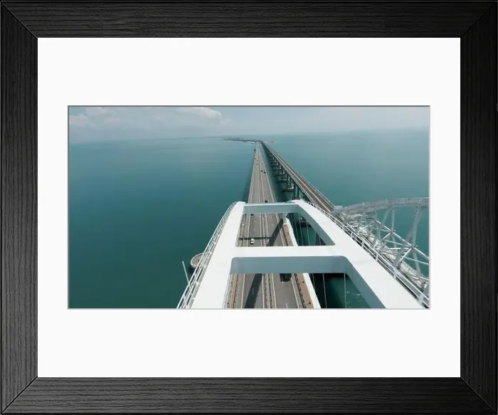 Framed Print : A long bridge for vehicles to cross the ocean Framed Print : A long bridge for vehicles to cross the ocean
