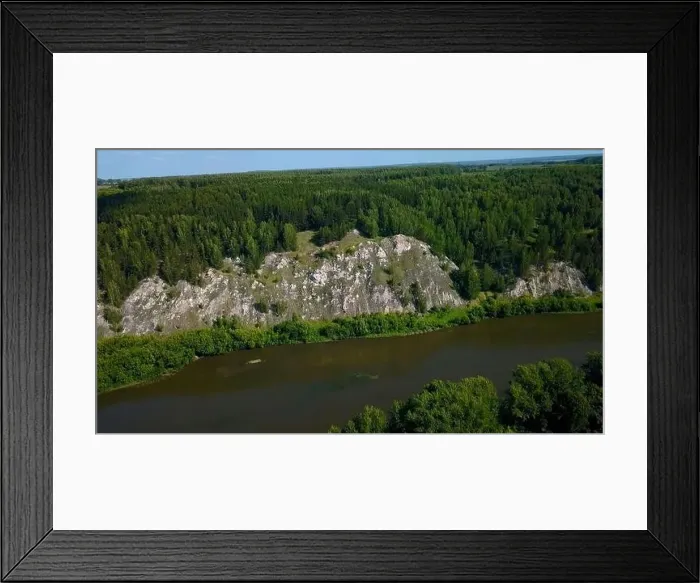 Framed Print : Aerial view of wild nature with rock clif and endless forest. Clip. Beautiful river along summer trees Framed Print : Aerial view of wild nature with rock clif and endless forest. Clip. Beautiful river along summer trees