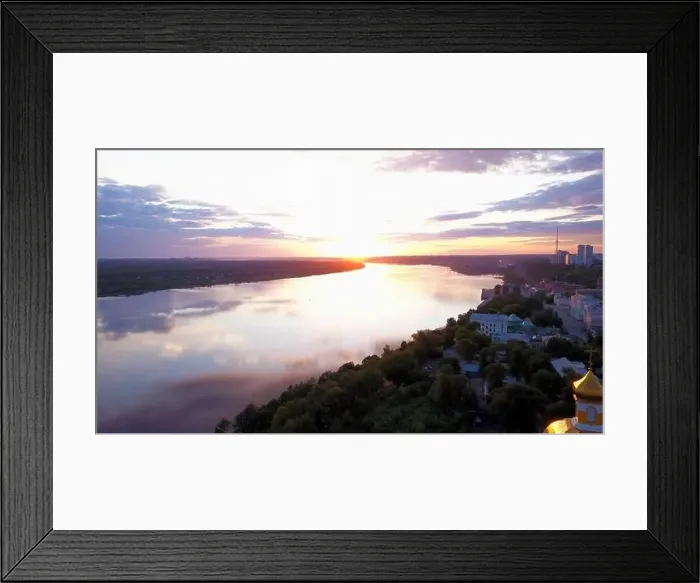 Framed Print : Flying above the city and a temple with golden dome located by the river Framed Print : Flying above the city and a temple with golden dome located by the river