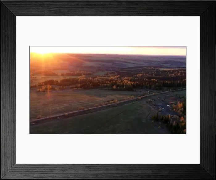 Framed Print : Aerial view of green fields, trees, and sunset sky on the background. Clip. Meadows crossed by long railroad Framed Print : Aerial view of green fields, trees, and sunset sky on the background. Clip. Meadows crossed by long railroad
