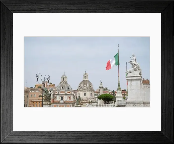 Framed Print : Italian town on a summer day. Action. Architecture of an old european town, old buildings and temples Framed Print : Italian town on a summer day. Action. Architecture of an old european town, old buildings and temples