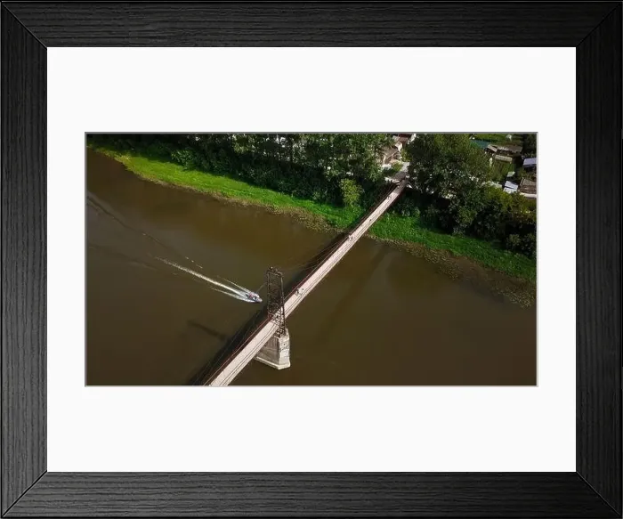 Framed Print : The bridge over the river. Clip. Car traffic on the bridge, iew from the top Framed Print : The bridge over the river. Clip. Car traffic on the bridge, iew from the top