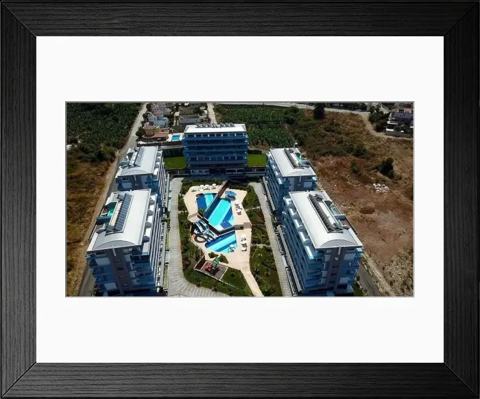 Framed Print : Aerial view of the hotel complex with swimming pools outdoors Framed Print : Aerial view of the hotel complex with swimming pools outdoors