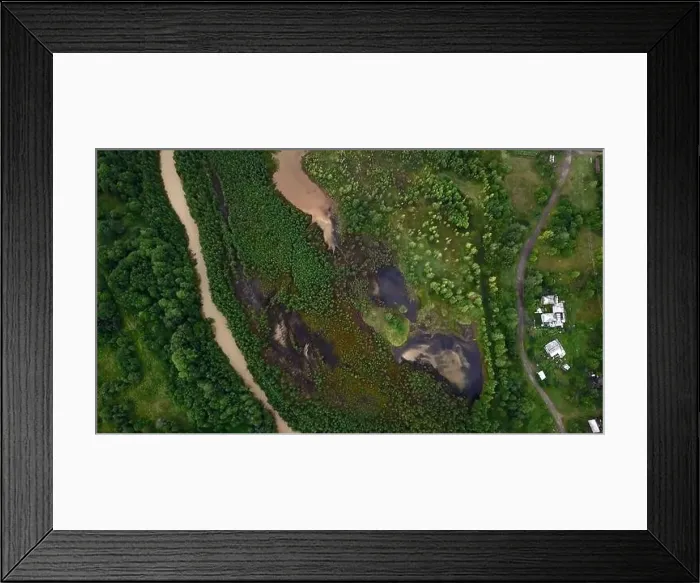 Framed Print : Lakes and swamps with surrounding vegetation, bushes and trees. Clip. Aerial view of curving river and bushes Framed Print : Lakes and swamps with surrounding vegetation, bushes and trees. Clip. Aerial view of curving river and bushes
