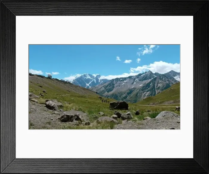 Framed Print : Aerial shot of Alps mountains and green grass covered slopes. Clip. Mountains, peaks, cliffs, rocks natural landscape Framed Print : Aerial shot of Alps mountains and green grass covered slopes. Clip. Mountains, peaks, cliffs, rocks natural landscape