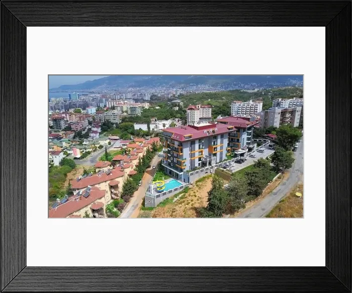 Framed Print : Picturesque summer city with many houses among greenery. Clip. Buildings and vegetation under the shining sun Framed Print : Picturesque summer city with many houses among greenery. Clip. Buildings and vegetation under the shining sun