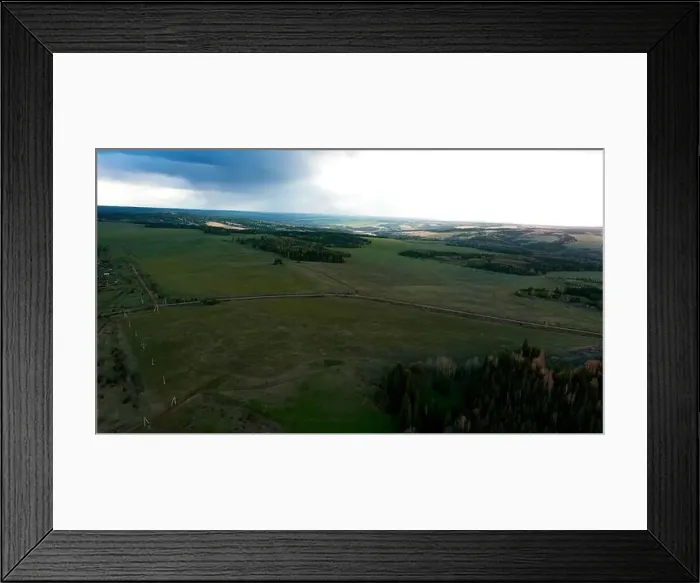 Framed Print : Road between green rice paddy fields in Thailand. Clip. Countryside region with endless meadows and forest Framed Print : Road between green rice paddy fields in Thailand. Clip. Countryside region with endless meadows and forest