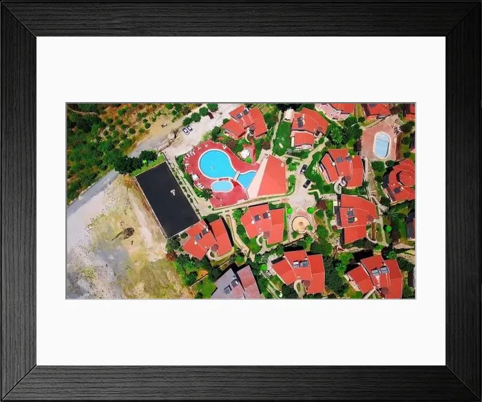 Framed Print : Aerial top view of small villas and open air swimming pool. Clip. Concept of summer holidays and tourism Framed Print : Aerial top view of small villas and open air swimming pool. Clip. Concept of summer holidays and tourism