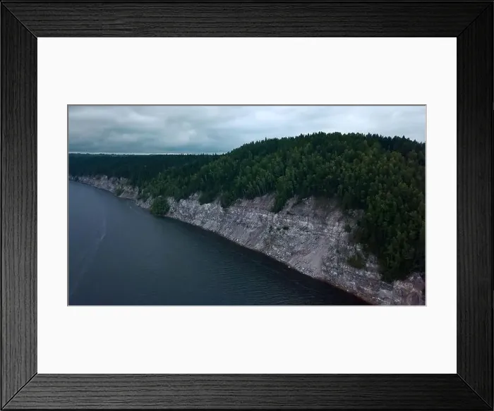Framed Print : Aerial view of a forested cliff and the large blue lake. Clip. Amazing water reservoir and green hills Framed Print : Aerial view of a forested cliff and the large blue lake. Clip. Amazing water reservoir and green hills