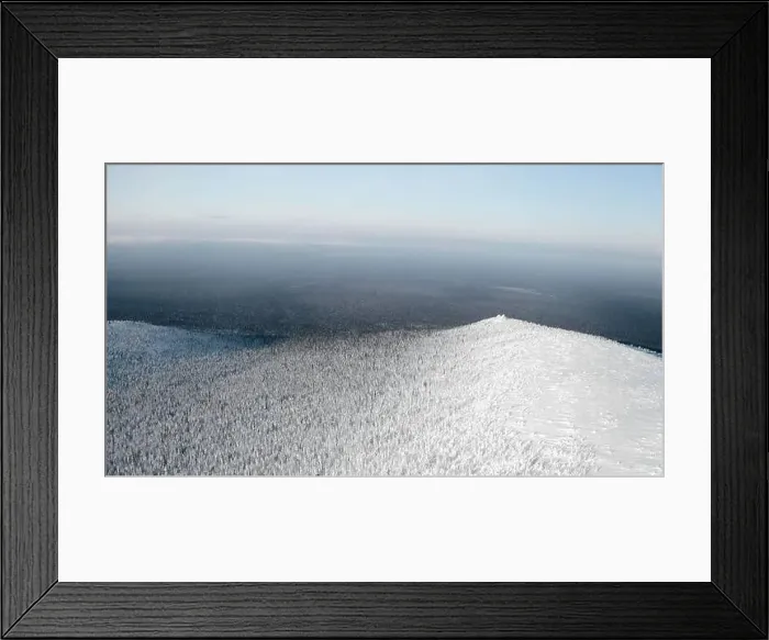 Framed Print : Calm and cold landscape with the endless valley of frozen forest. Clip. Aerial view of a snow covered mountain Framed Print : Calm and cold landscape with the endless valley of frozen forest. Clip. Aerial view of a snow covered mountain